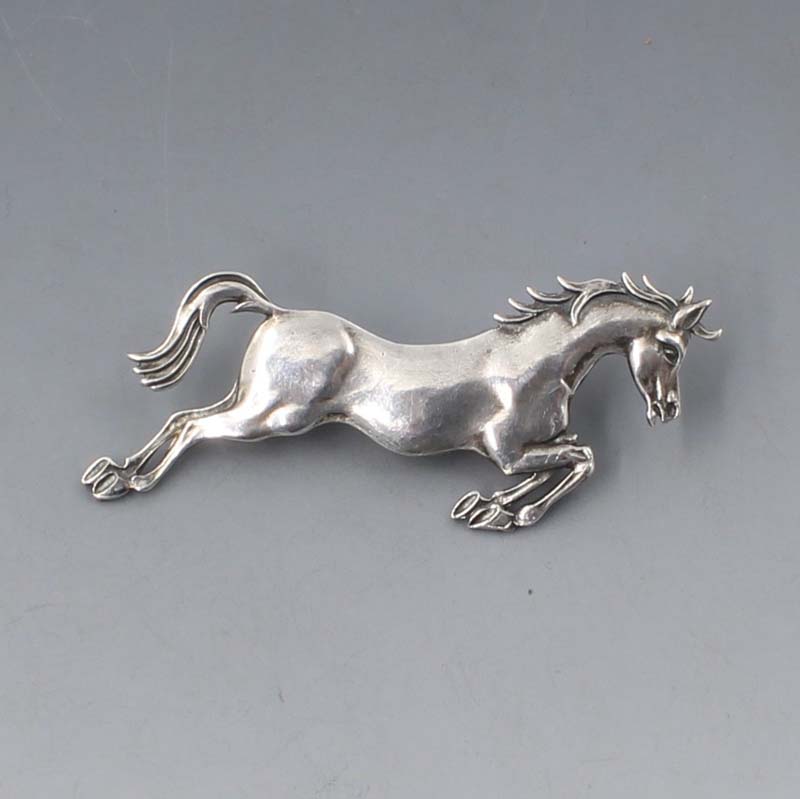 Silver horse brooch deals